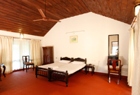 Bed Room at Tharavadu Heritage Hotel